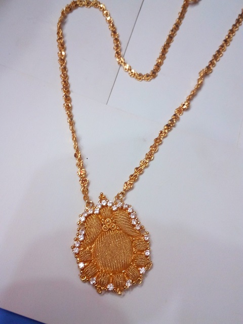 Gold covering deals dollar chain